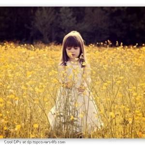 Cute-Girl-In-A-Flower-Field-Display-Picture