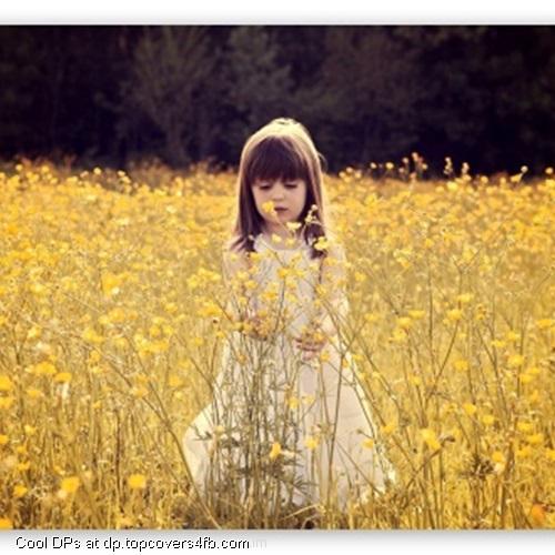Cute-Girl-In-A-Flower-Field-Display-Picture