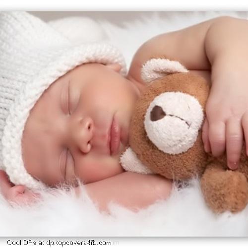 Cute-Sleeping-Baby-With-Teddy-Bear-Display-Picture