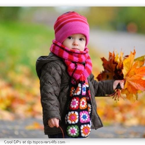 Kid-With-Yellow-Leaves-Display-Picture