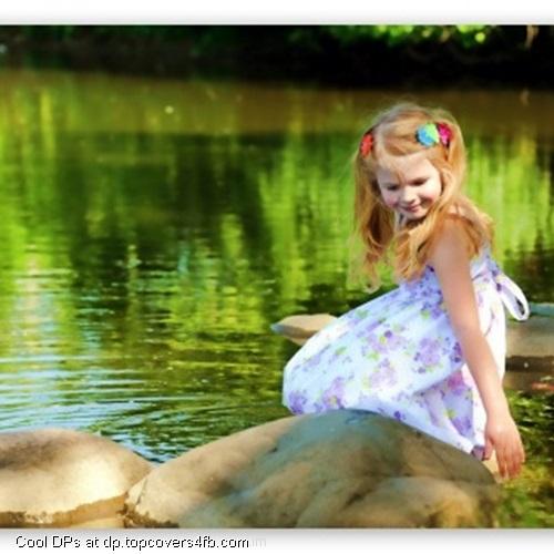 Little-Girl-Enjoying-Near-River-Display-Picture