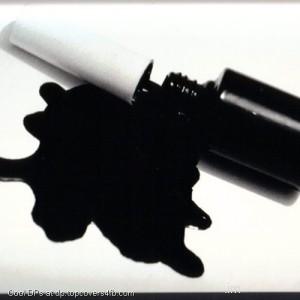 Black-Nail-Polish-On-White-Paper-Display-Picture