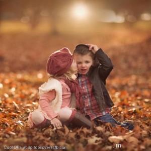 Cute-Girl-Kiss-Boy-Fall-Leaves-Display-Picture