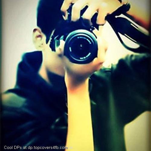 Cool-Boy-With-Camera-Display-Picture