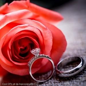 Wedding-Rings-And-Rose-Flower-Display-Picture