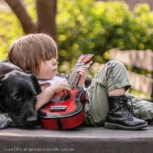 Cute-Boy-Playing-Guitar-Display-Picture