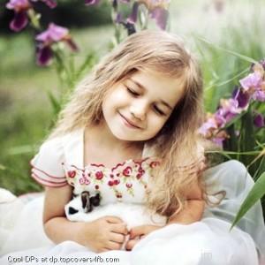 Cute-Girl-With-Irises-Flowers-Display-Picture