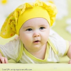 Baby-Lying-On-Green-Display-Picture