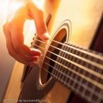 Guitar-String-And-Hand-Display-Picture