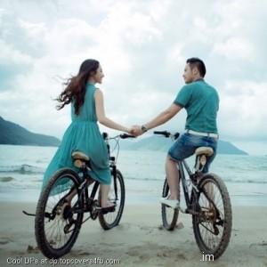 Riding-Bicycles-On-Beach-Display-Picture