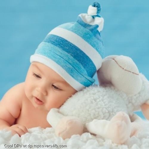 Sweet-Baby-And-White-Sheep-Toy-Display-Picture